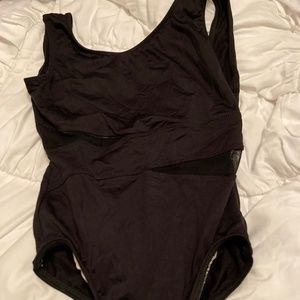 black leotard with mesh cutouts